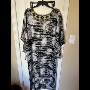 African print dress. Lift your arms and it looks like an angel 😇